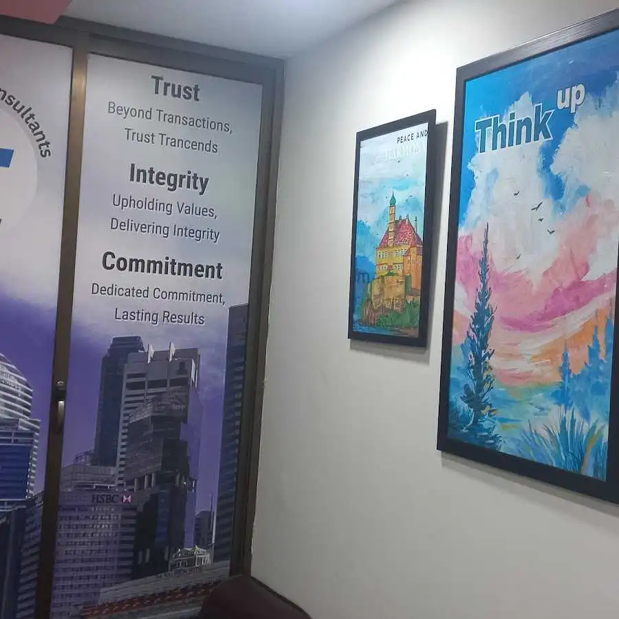 Interior of our office in Islamabad — modern workspace with desks and natural light