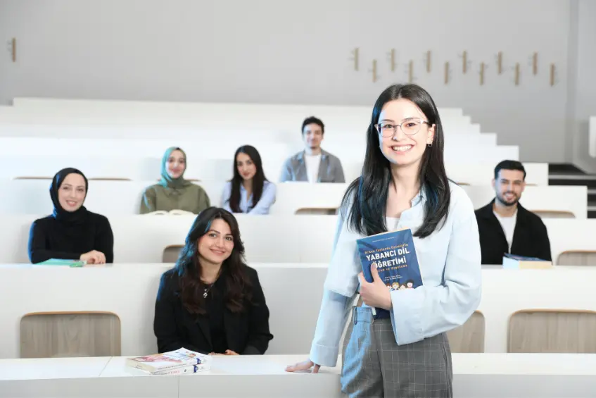Pakistani students attending a lecture in a UK university