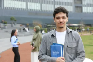 Pakistani students standing in the lawn of a London university