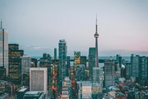 Toronto skyline with CN Tower representing Canada immigration and Express Entry opportunities for senior managers